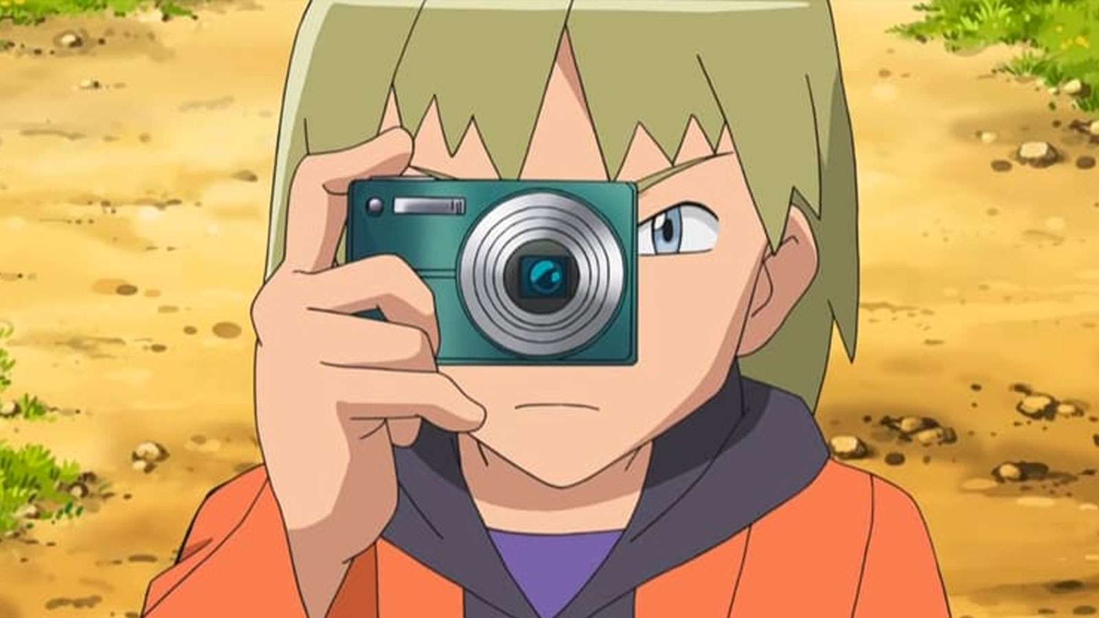 Un dresseur Pokémon avec un appareil photo